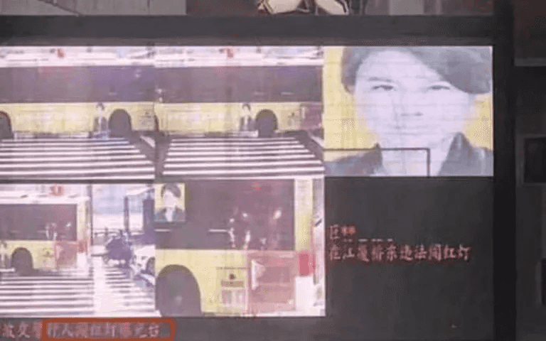 A screen showing several images of a moving bus with an advertisement on the side showing a woman's face. The woman's face is shown enlarged on the right.